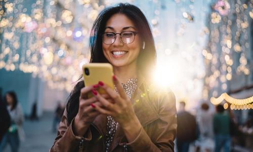 smiling woman on mobile phone